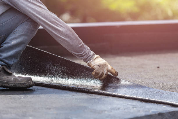 Professional Exterior Waterproofing technician working in Grand Rapids, MI
